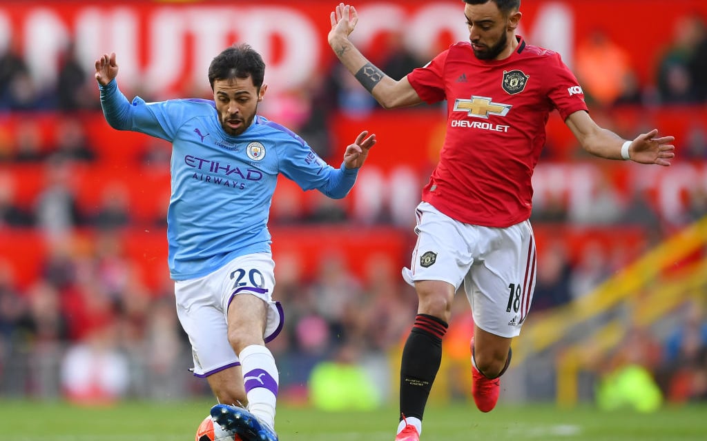 Bernardo Silva takes on Bruno Fernandes.