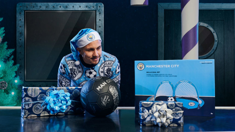 GAZING : Angelino eyes up some festive treats.