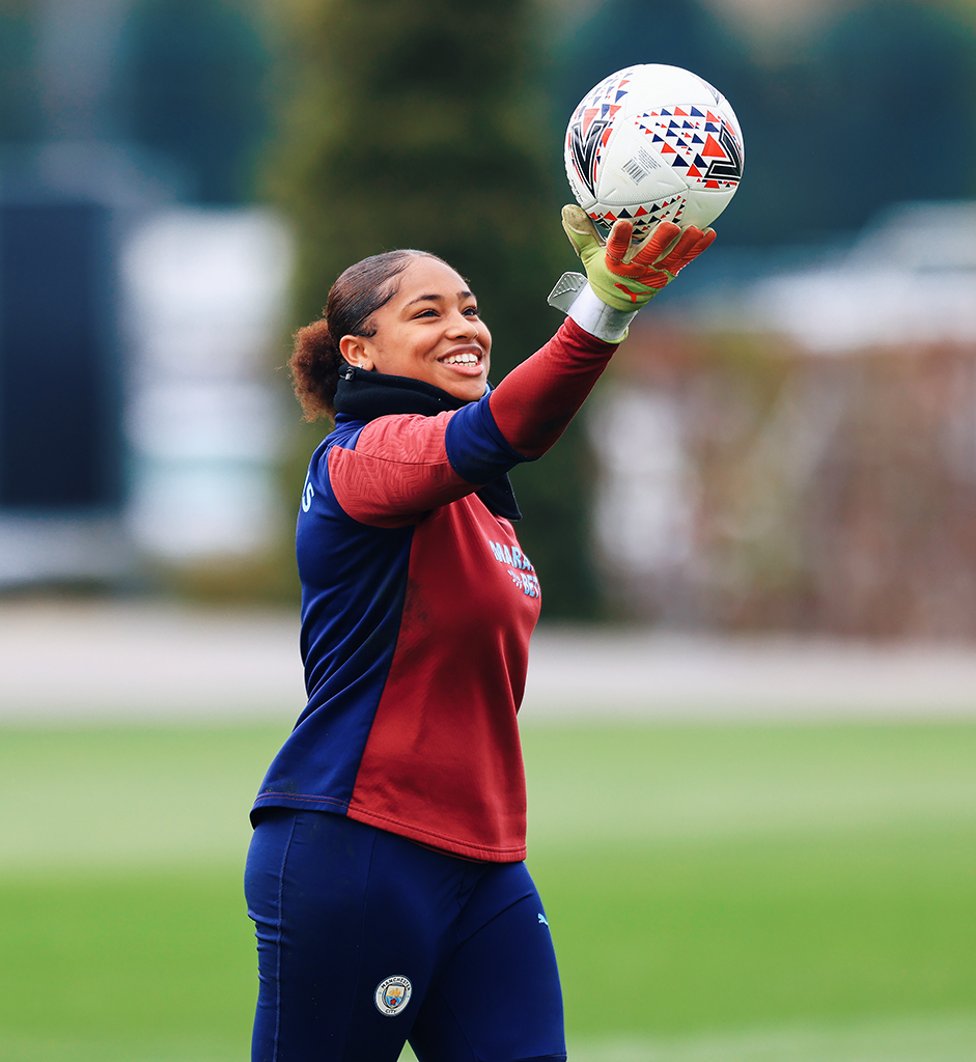 SAFE HANDS : Get yourself someone who looks at you how Khiara looks at a football!