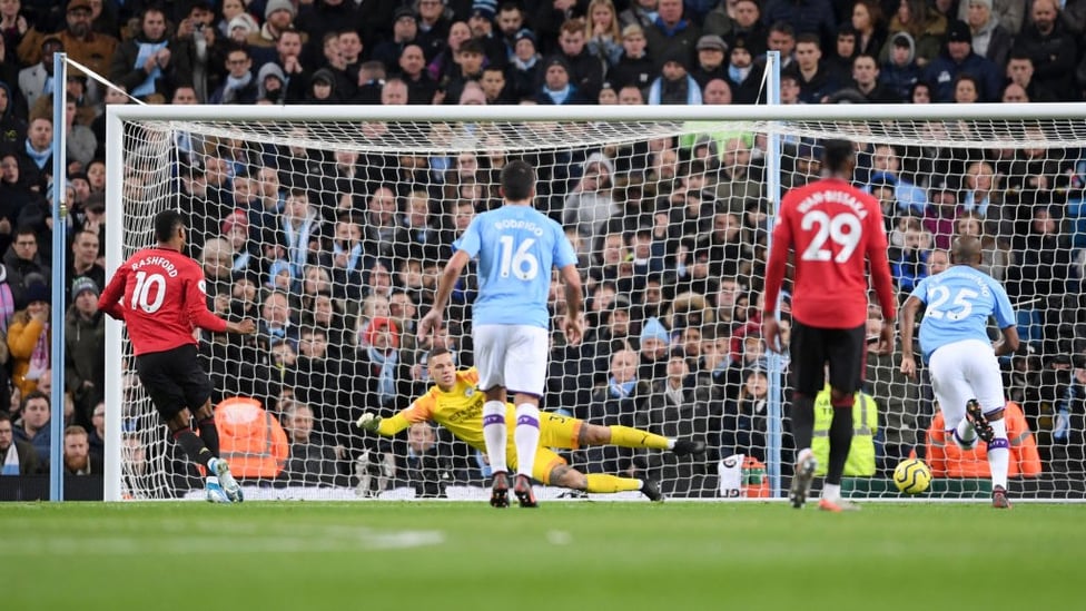 BLOW : Marcus Rashford puts the visitors ahead from 12-yards.