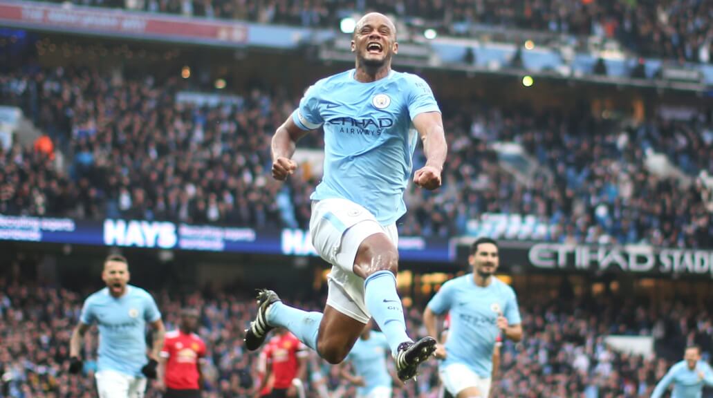 LEADER : Vincent Kompany powers City ahead