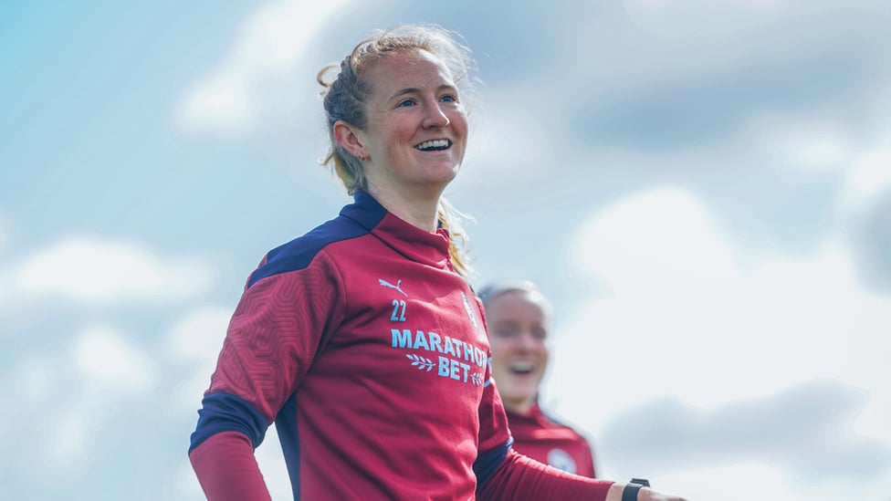 FUN IN THE SUN: Sam Mewis shows off her pearly whites
