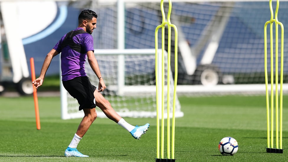 SLIDE RULE : Riyad Mahrez picks a pass.