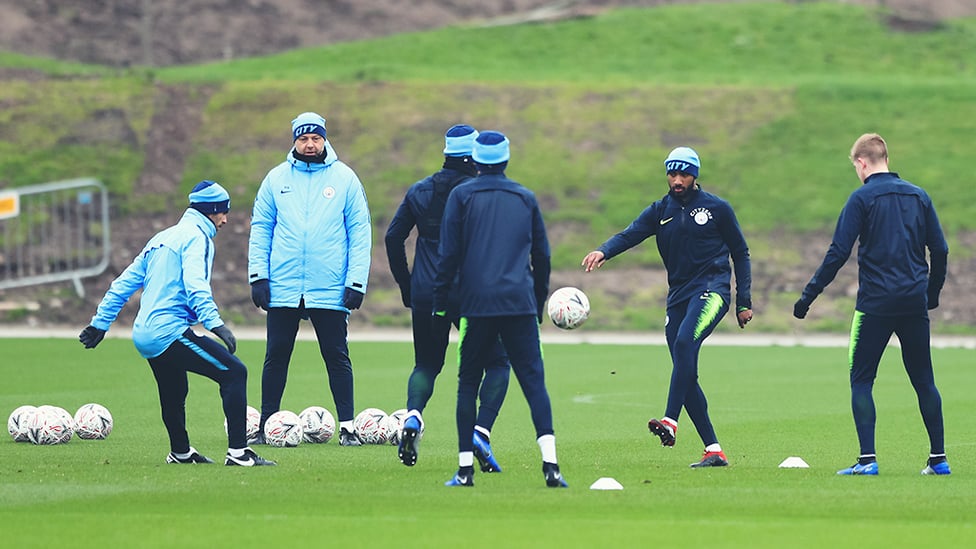 RONDO TIME : Fabian Delph and Kevin De Bruyne are amonsgst those working on their close-quarter skills