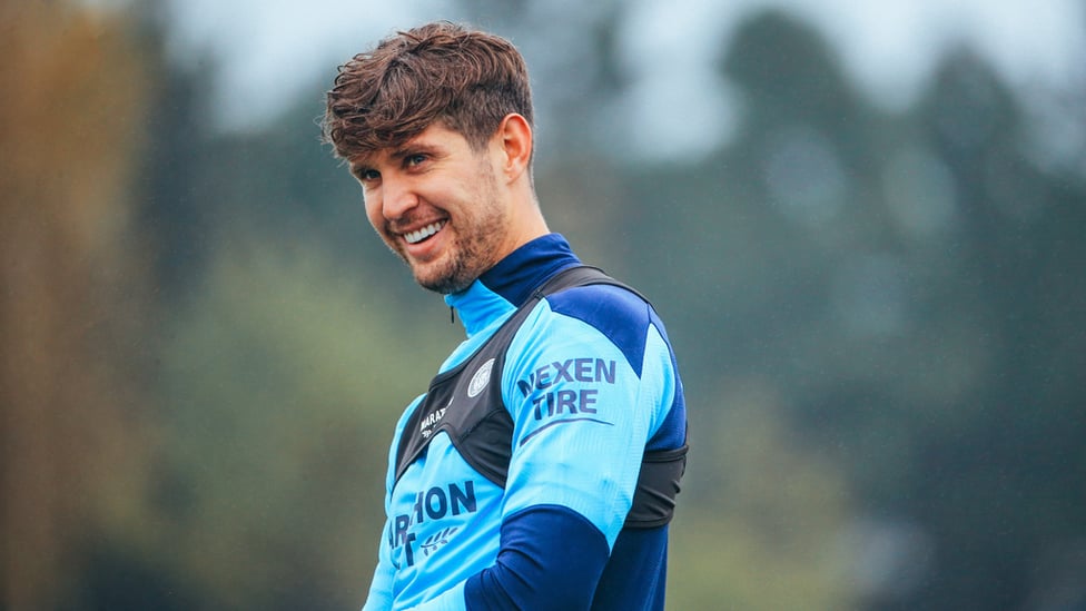 ALL SMILES: John Stones was in upbeat mood despite the gloomy October weather