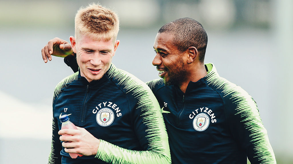 TWO'S COMPANY: Something has tickled Fernandinho and Kevin De Bruyne