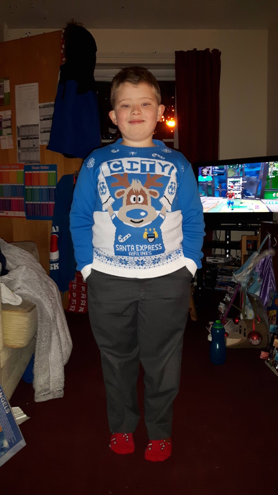 QUINN HOLMES : "This little fellow is nearly eight years old and a big City fan. He been helping to get people's shopping and take it to them and he also helps his dad cook some meals, help with housework and help with general day-to-day stuff. He is missing his nanna and grandad but goes and gets them what they need. He has even bought a writing pad and envelopes so he can write and draw people a big smiley face to help keep them smiling through this tough time."