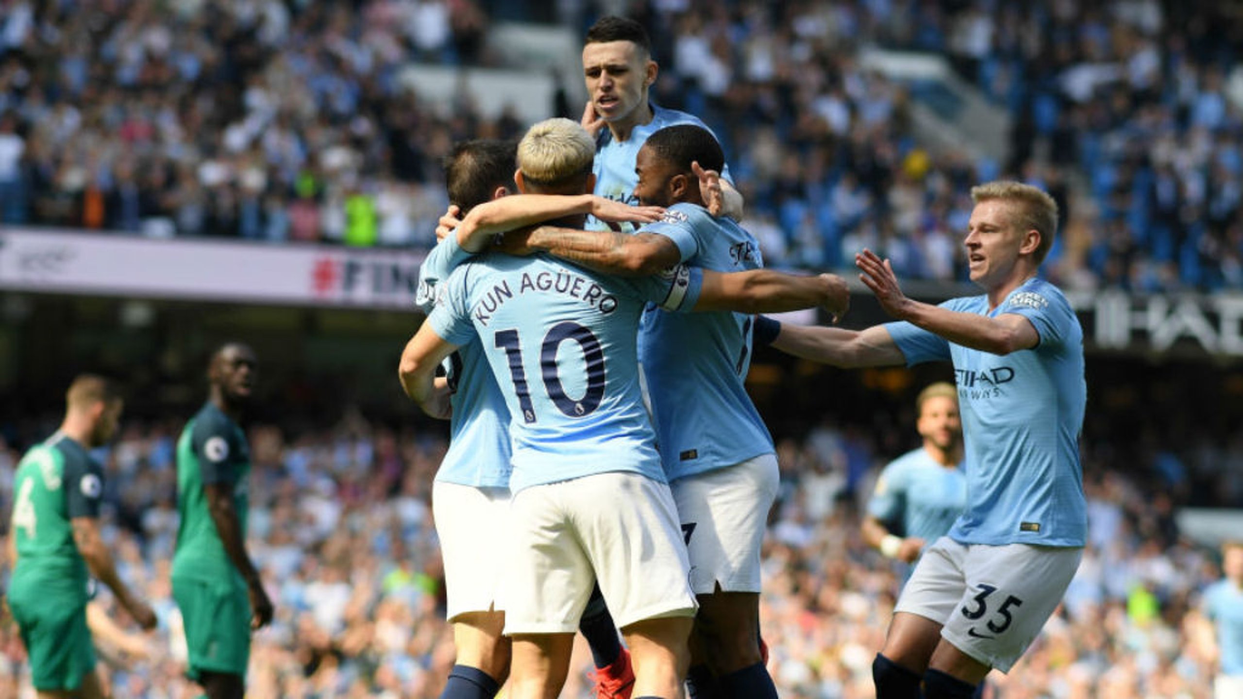 RISE AND SHINE: Phil Foden celebrates his goal with his City team-mates