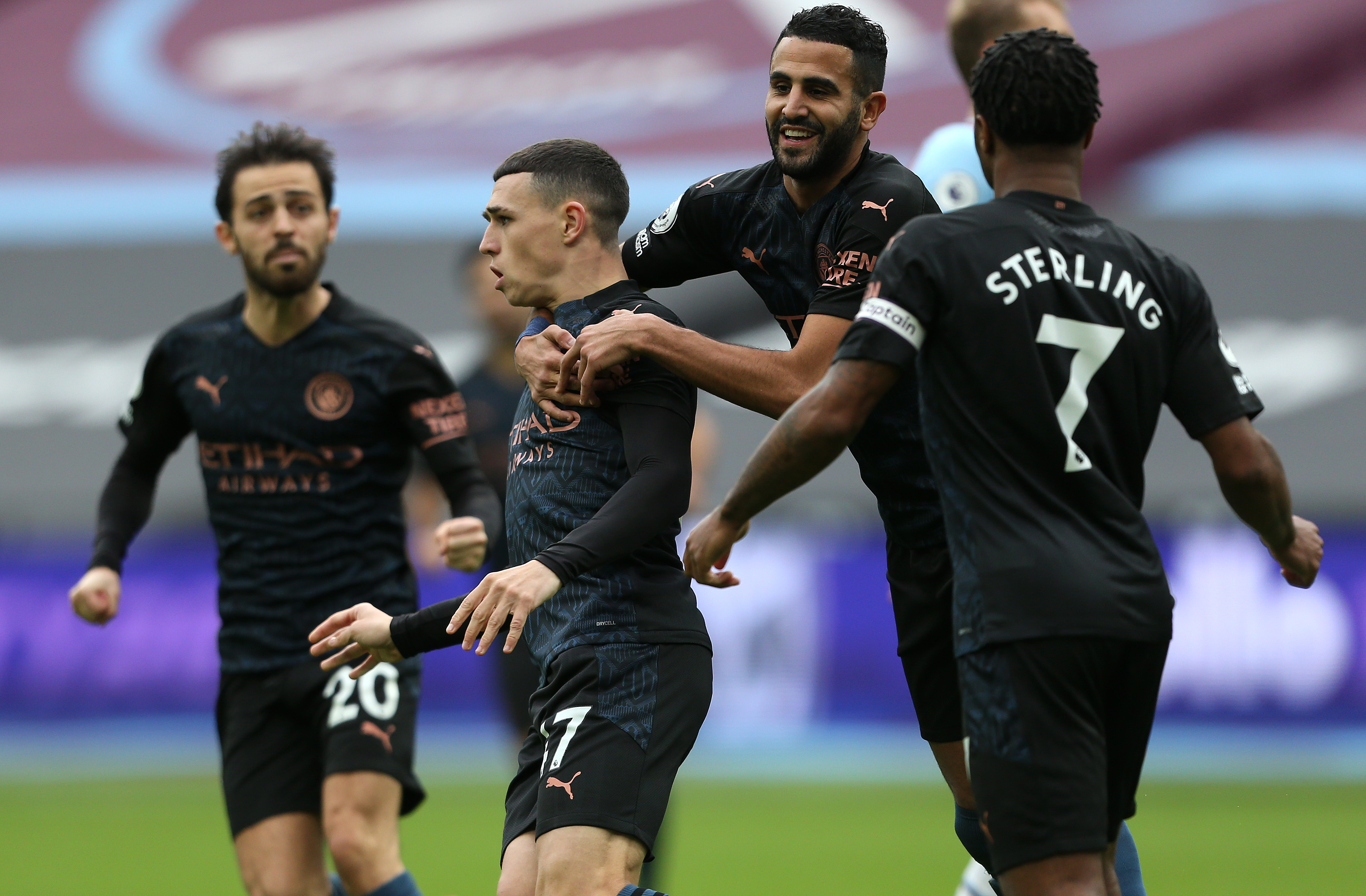 LEVEL BEST: Phil Foden is mobbed by his team mates after scoring