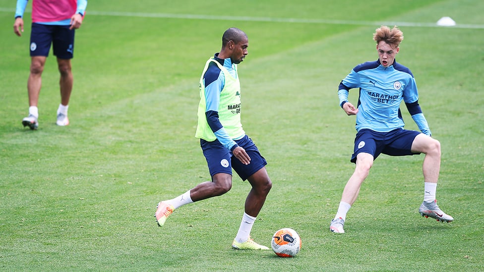 YOUNG GUN : Cole Palmer presses Fernandinho.