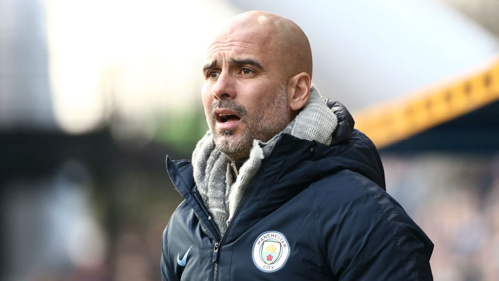 LEADING MAN : Pep looks on from sidelines as the action unfolds at the John Smith's Stadium