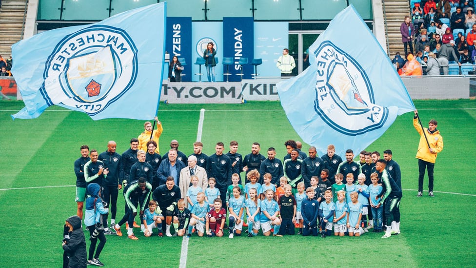 CITYZENS : A group of lucky fans got the chance to join the players for a team photograph