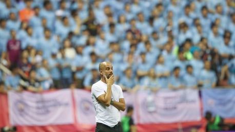 THE GAFFER: Guardiola watches on