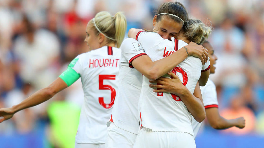 SHEER JOY : Jill Scott celebrates with her team-mates after her early goal