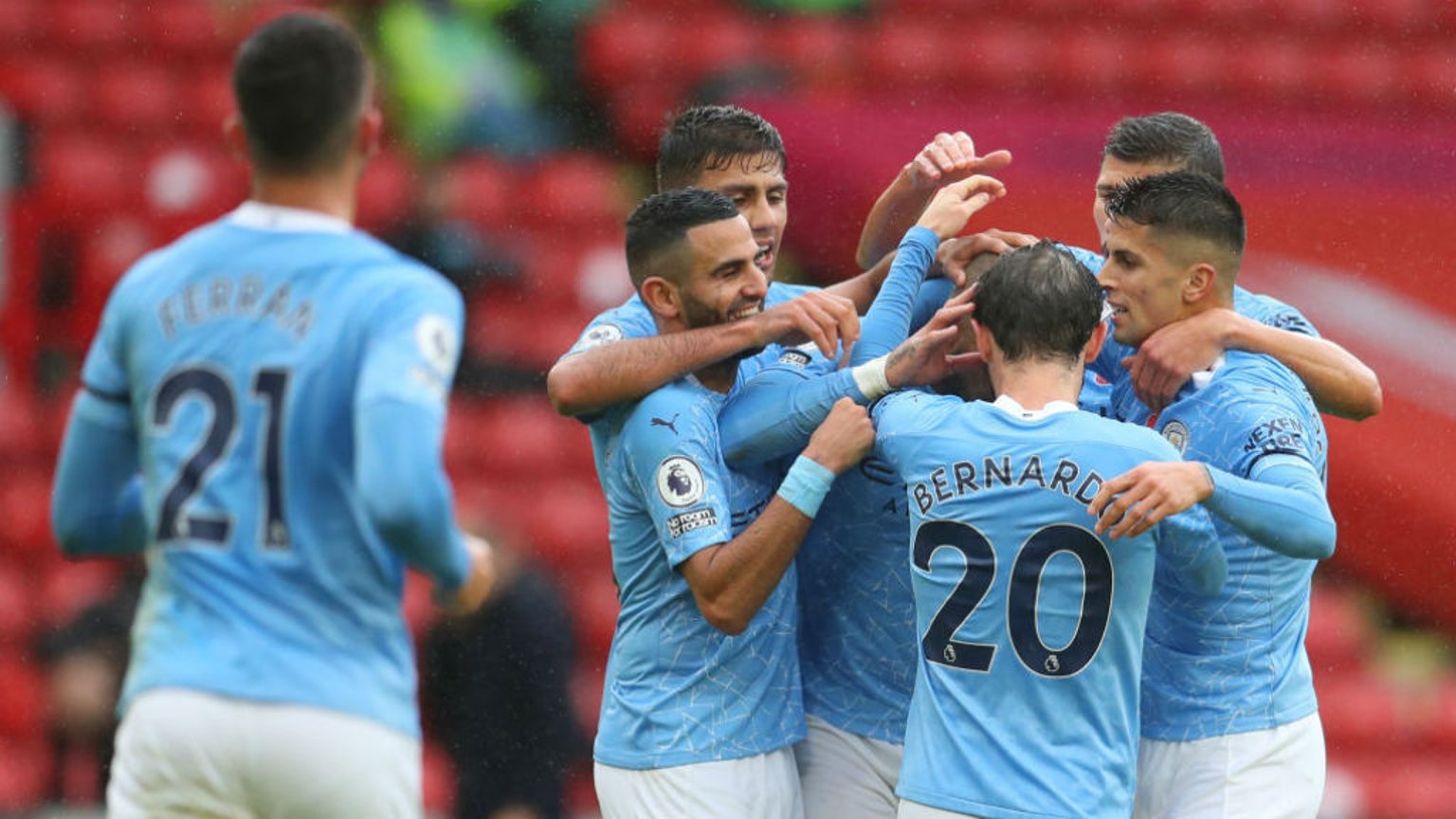 ON THE MARK: Kyle Walker is mobbed by his City team-mates after breaking the deadlock