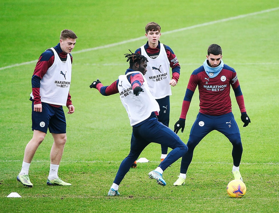 MIDDLE MAN : Ferran Torres gives chase during a rondo.