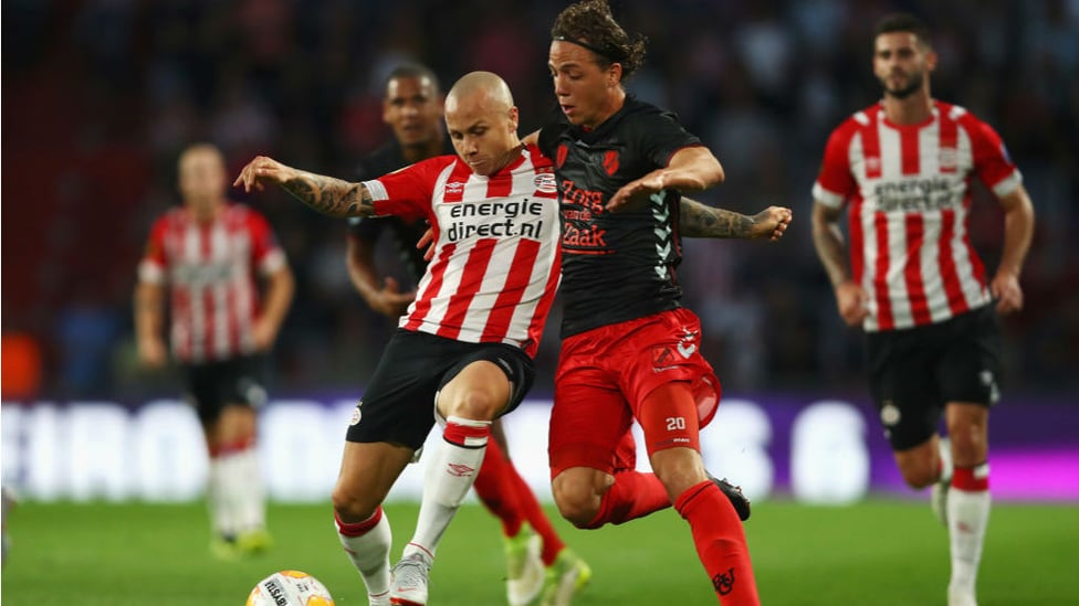 DUTCH COURAGE : Angelino enjoyed a superb season in the Eredivisie with PSV last term and is seen here in the thick of the action against Utrecht