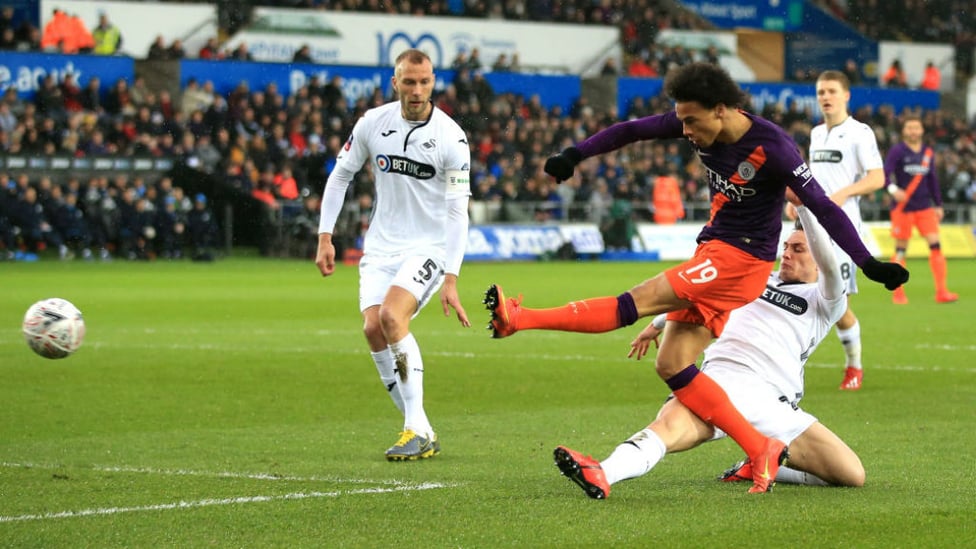 CLOSE CALL : Leroy Sane unleashes a left-foot shot on the Swansea goal