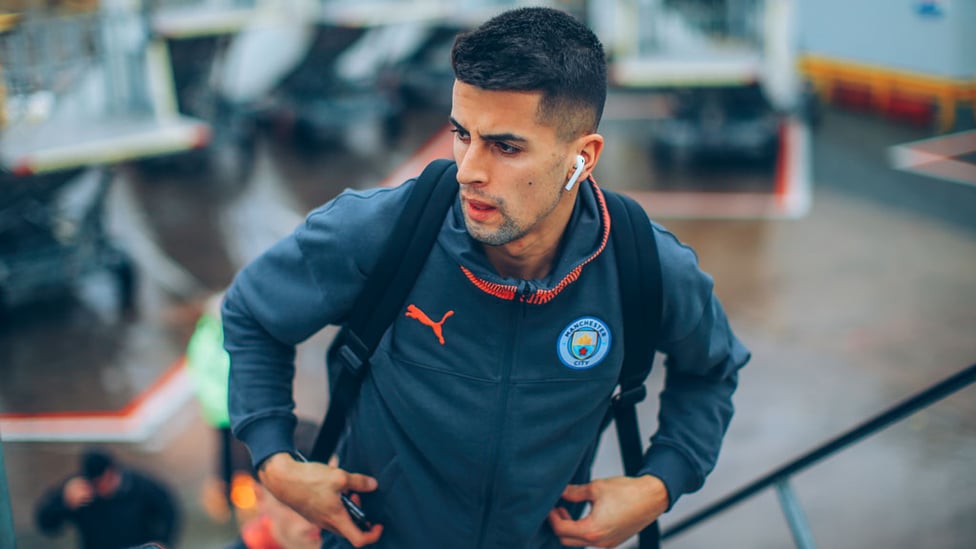 UP AND AT 'EM : Joao Cancelo boards the plane bound for Zagreb