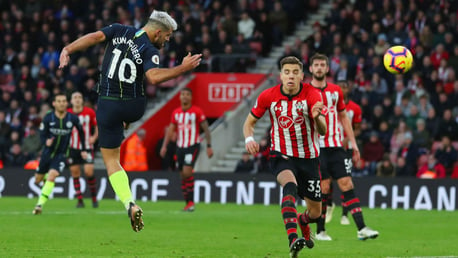 UP AND AT 'EM: Sergio Aguero leaps to head home our third goal in first half injury time