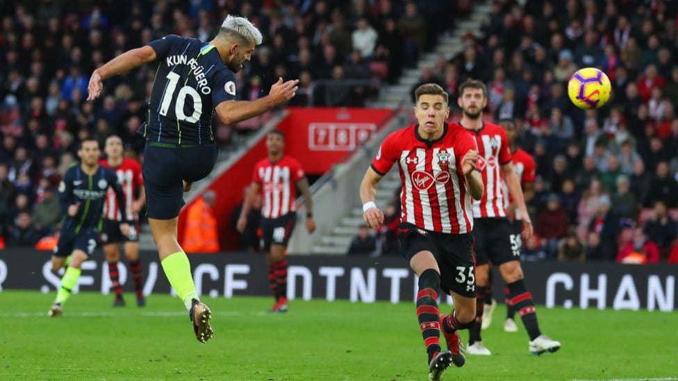 UP AND AT 'EM : Sergio Aguero leaps to head home our third goal in first half injury time