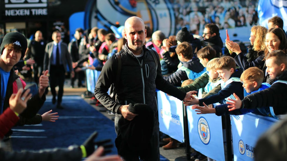 BIRTHDAY BOSS : The sun shines on Guardiola as he arrives for business as usual on his big day.