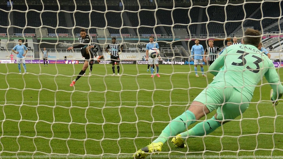 PENALTY: Scott Carson guesses right, but can’t quite get to Joelinton’s penalty on the stroke of half-time