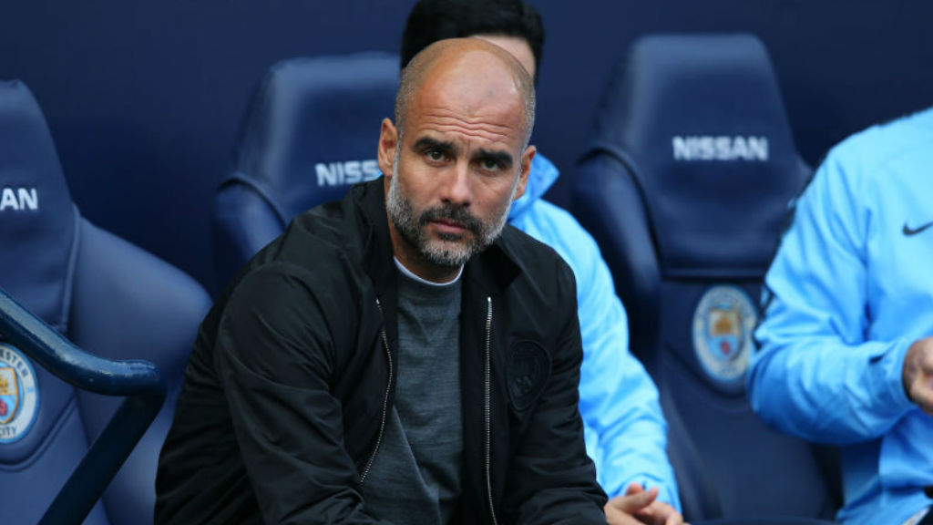 WATCHING BRIEF: Pep Guardiola keeps an eye on proceedings during the game against Burnley