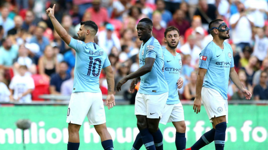 LETHAL WEAPON: Sergio Aguero acknowledges the City fans after his second goal of the afternoon