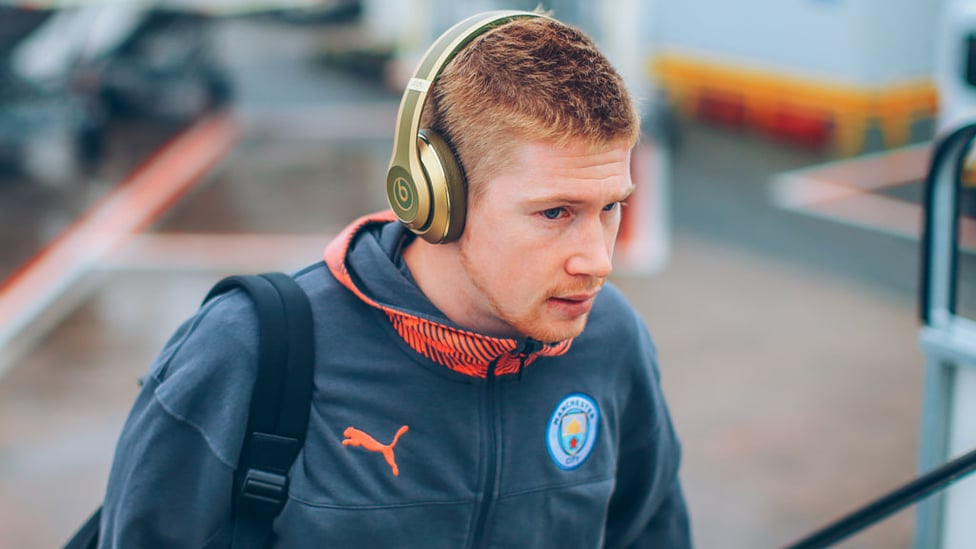 EAR WE GO : Kevin De Bruyne sported some nifty headphones ahead of departure