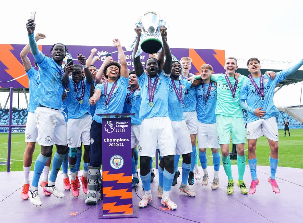 NATIONAL CHAMPIONS: Skipper Kwaku Oduroh proudly lifts the Premier League Under-18 National trophy aloft