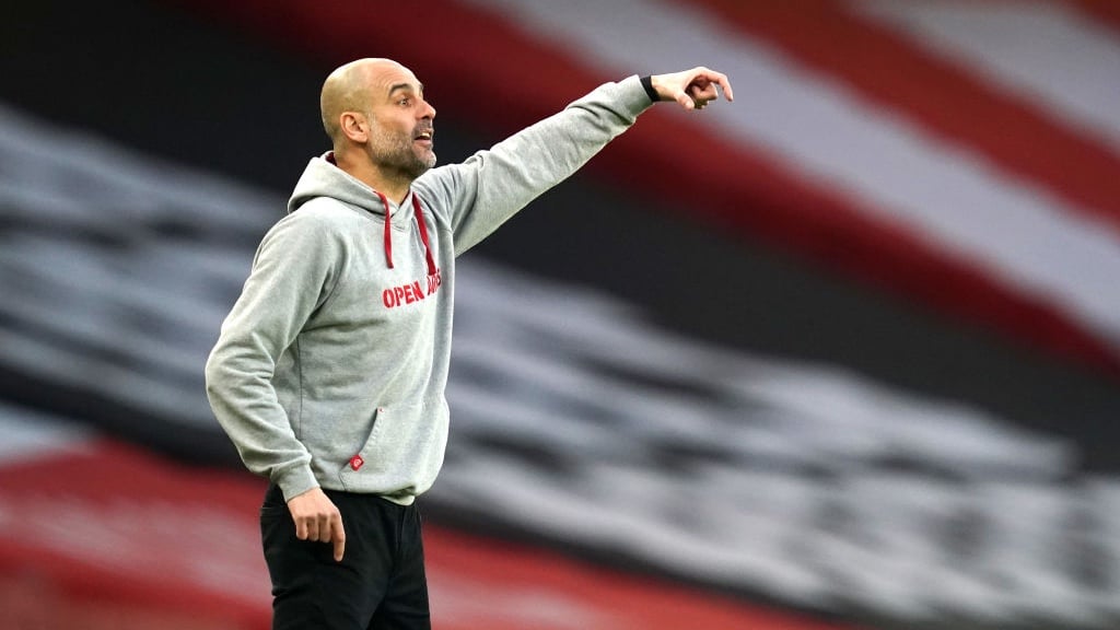 PEP TALK: The boss provides instructions from the touchline.