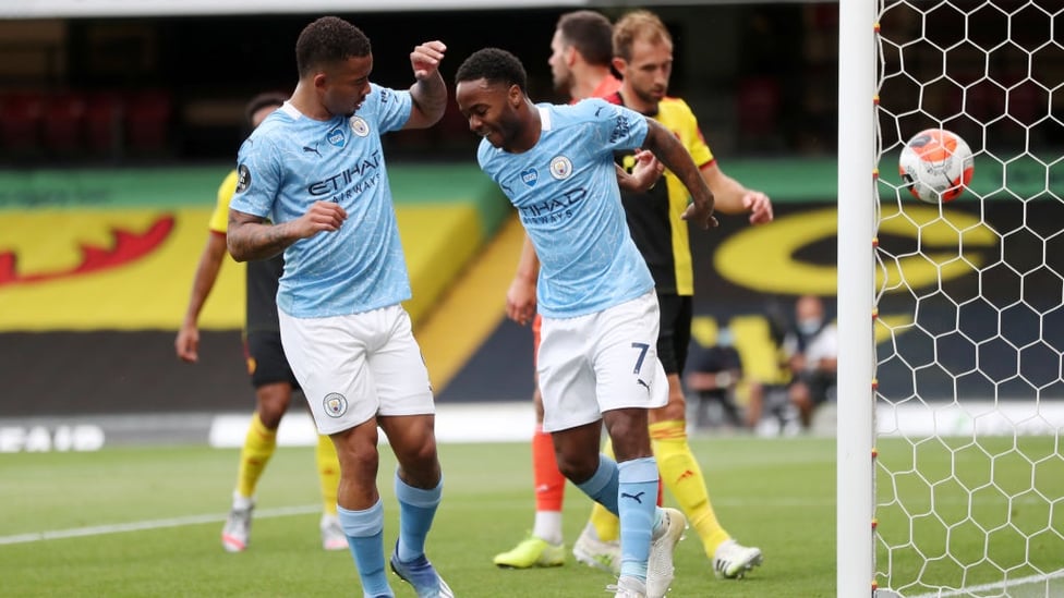 PRAYERS ANSWERED : Jesus celebrates with Sterling after the good fortune involved in his second goal.