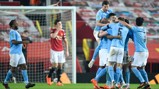 FERNATASTIC: Fernandinho is mobbed by his teammates
