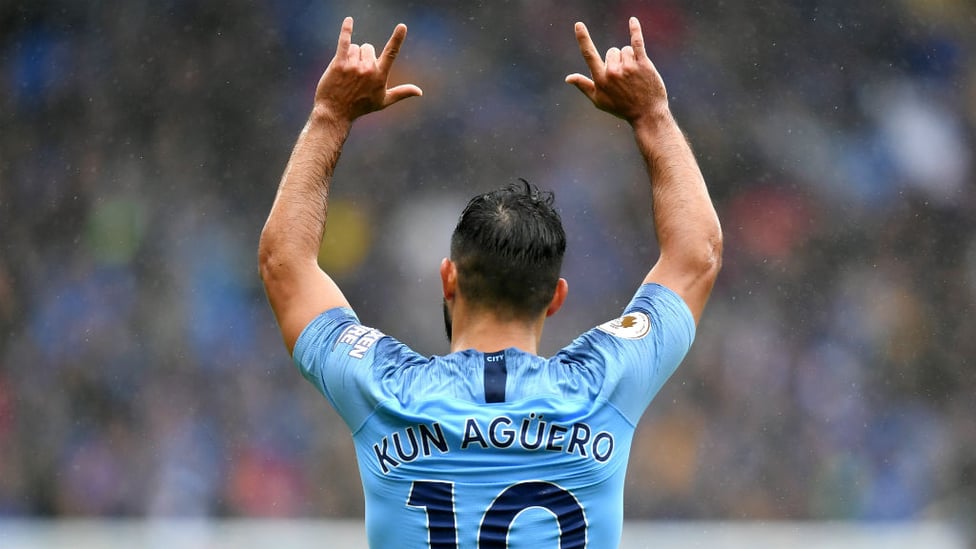 SERGIO SALUTE : Aguero celebrates a goal on his 300th appearance