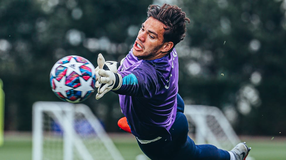 FULL STRETCH : Fingertip save from Ederson.