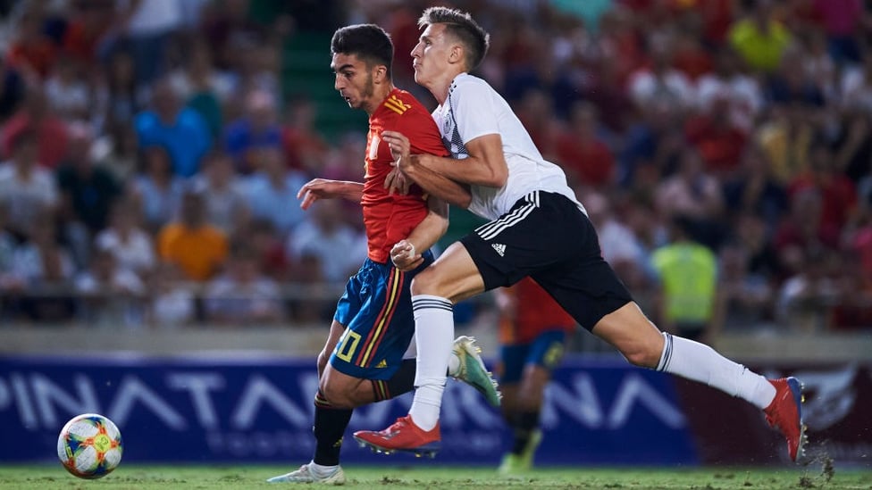 LA ROJA : Driving forward with Spain U21s in friendly against Germany. Torres was also capped at U17 and U19 level.