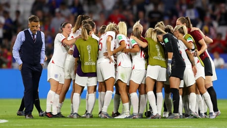 TOGETHER: England unite in a huddle after the game, in a symbol of solidarity