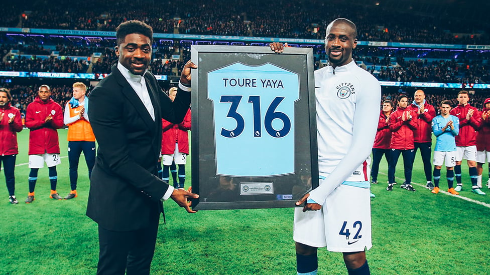 CLUB LEGEND : Receiving his parting gift from brother Kolo