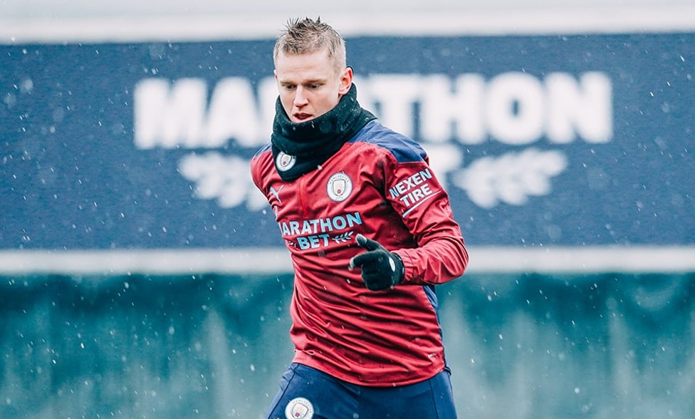 WORKING HARD : The winter conditions didn't look to put Oleksandr Zinchenko off