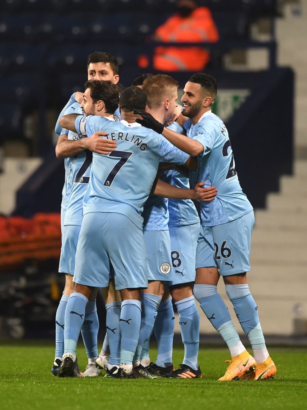 GROUP HUG : The players share the love after Gundogan's accurate opener.