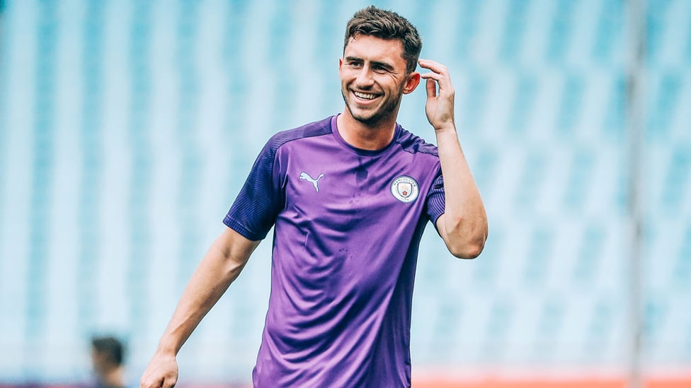 HIGH SPIRITS : Aymeric Laporte flashes a smile.