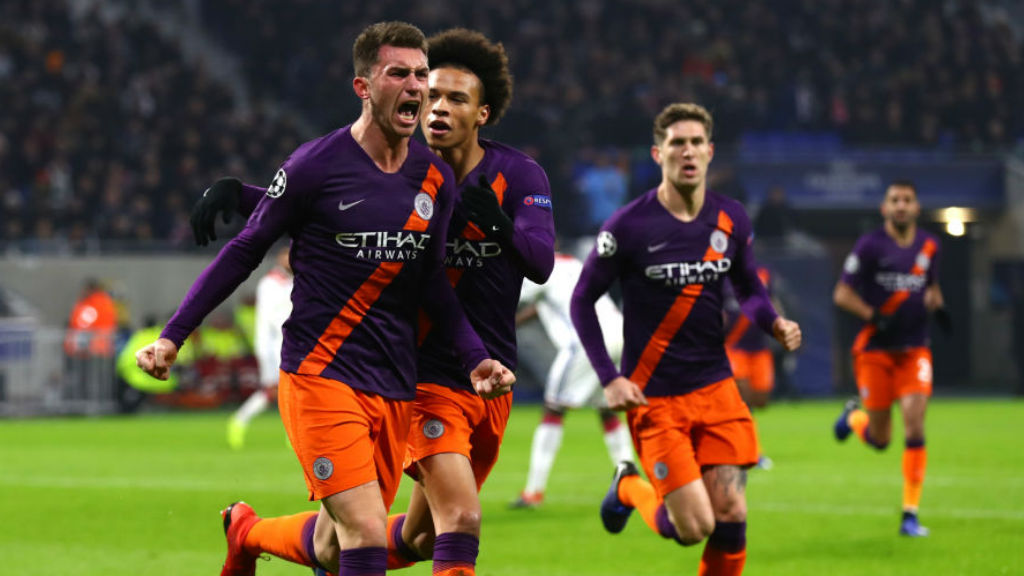 LEVEL BEST : Aymeric Laporte roars with delight after heading home for City v Lyon