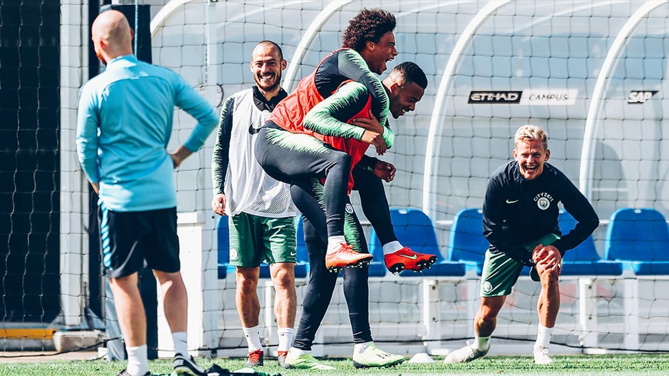 PIGGY BACK : Leroy Sane hitches a lift, much to the amusement of David Silva