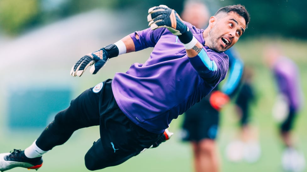 FLYING : Claudio Bravo at full-stretch.