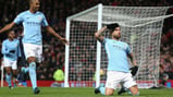 BACK IN FRONT: Nicolas Otamendi slides into his celebration after volleying City ahead on a day of derby delight at Old Trafford