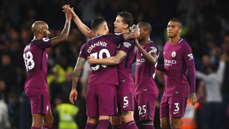 JOB DONE: The City players celebrate after a huge victory