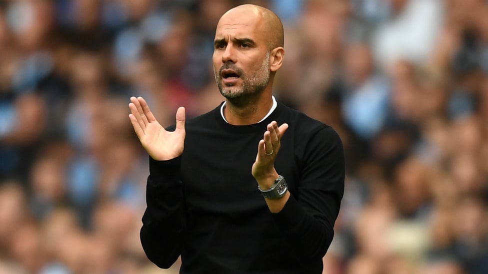 IMPRESSED : Pep Guardiola, enjoying what he's seeing