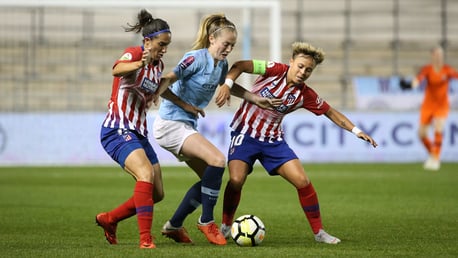 WALSH: Keira takes on the Atletico duo.