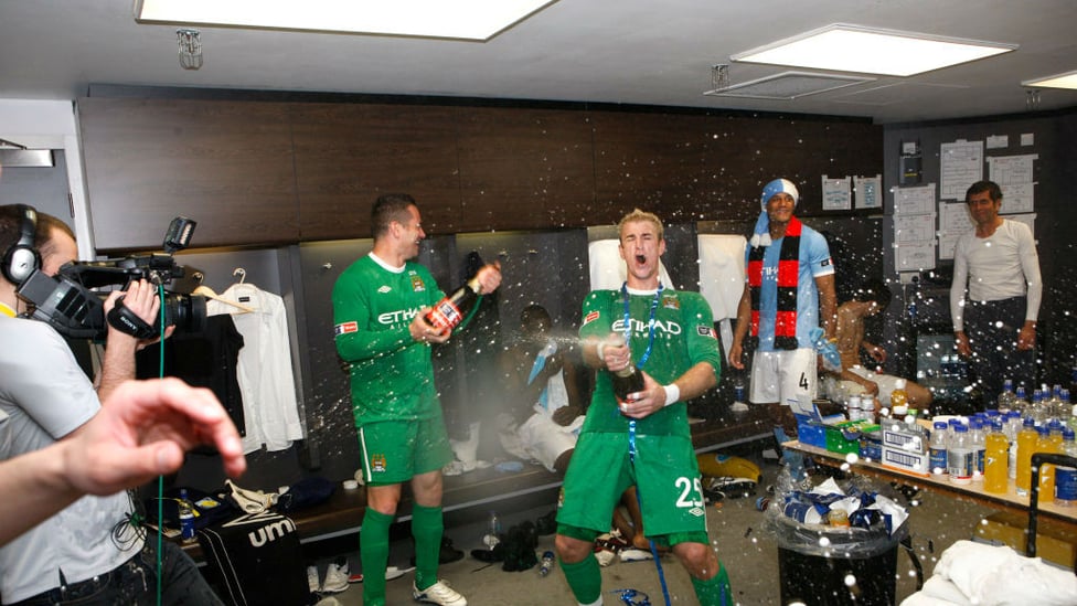 CELEBRATIONS : Excitement in the dressing room after City's FA Cup win in 2011.